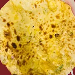 103. Tandoori Aloo Paratha.